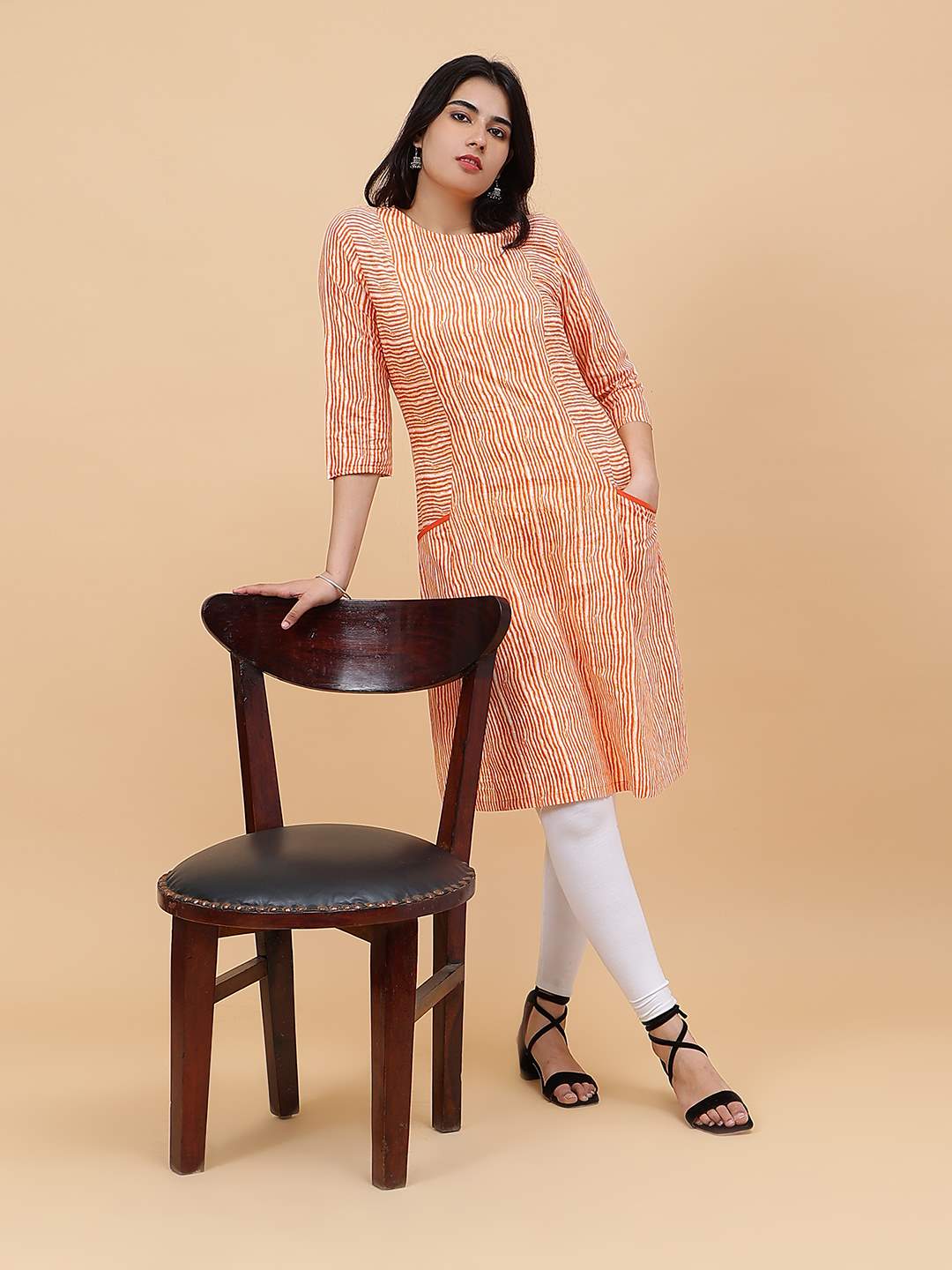 Women Orange And White Printed Cotton Kurti