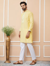 Yellow Solid Cotton Straight Kurta with Pyjama with Jacquard neckline