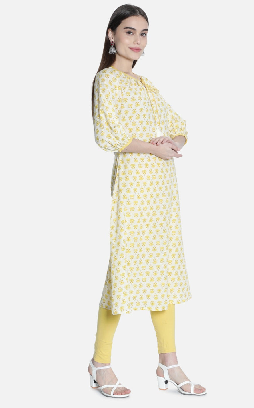 Women Off White And Yellow Printed Kurti